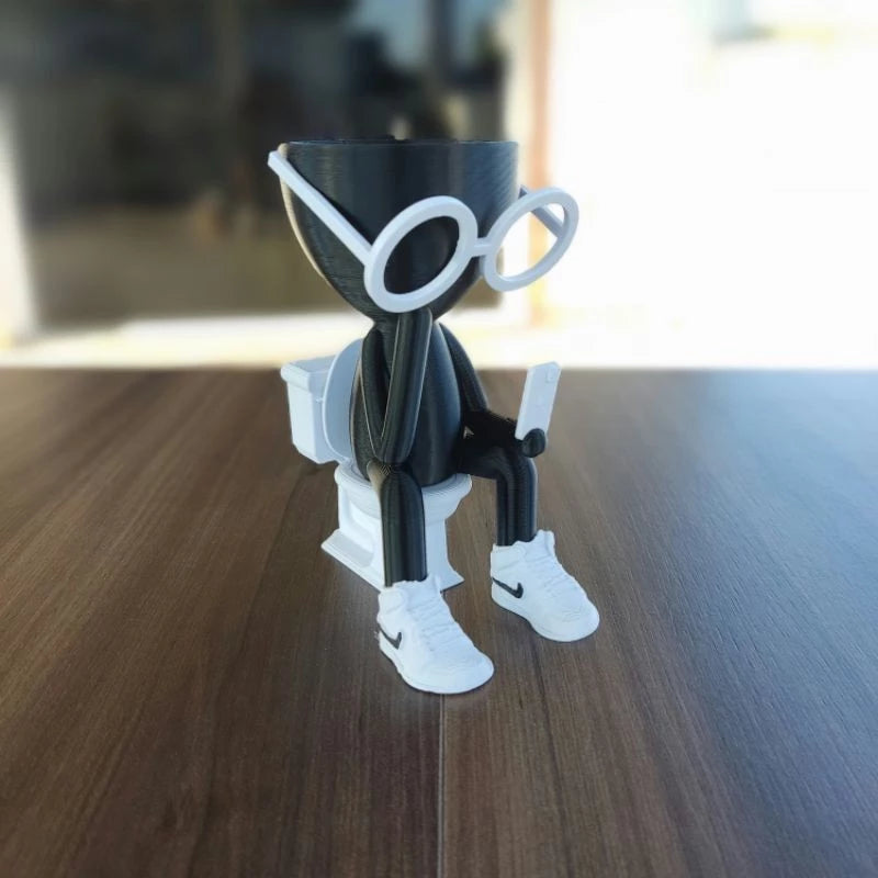 Vaso Decorativo Robert Plant no Banheiro com celular