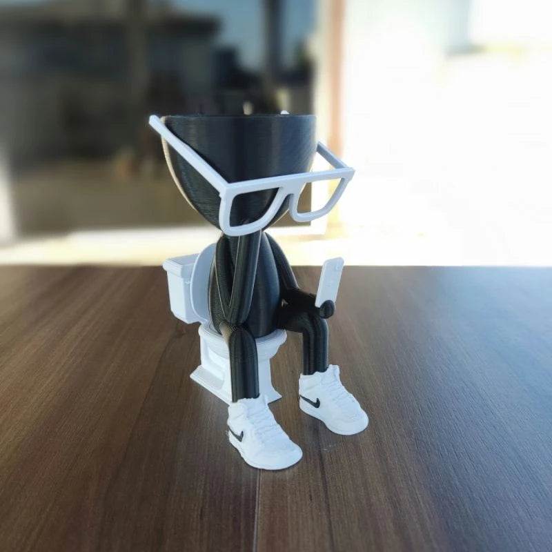 Vaso Decorativo Robert Plant no Banheiro com celular