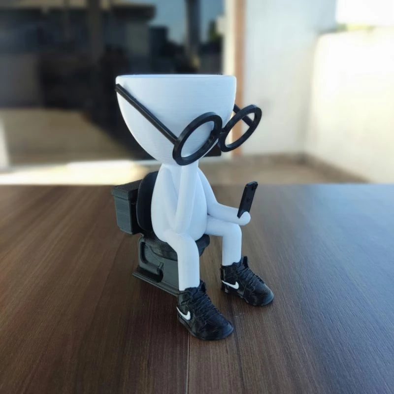 Vaso Decorativo Robert Plant no Banheiro com celular