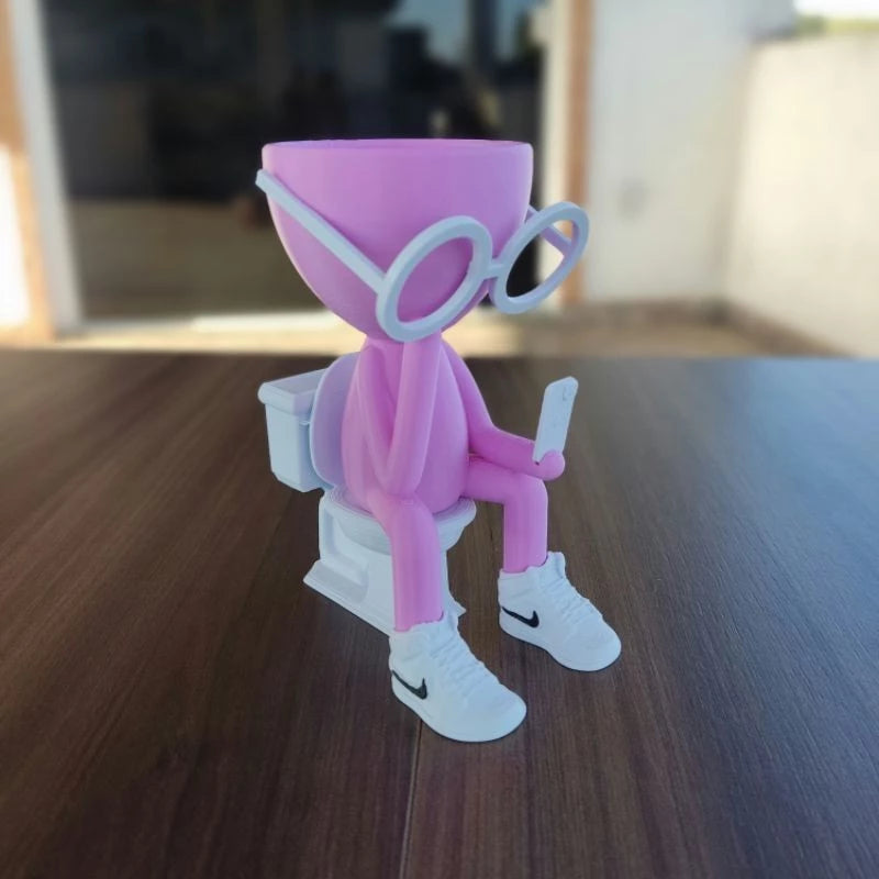 Vaso Decorativo Robert Plant no Banheiro com celular